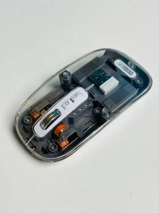 GearUP WM30 Transparent Crystal Wireless Mouse in Gray Color featuring Bluetooth and 2.4G dual connectivity, magnetic top, and USB-C rechargeable battery – perfect for modern workstations.